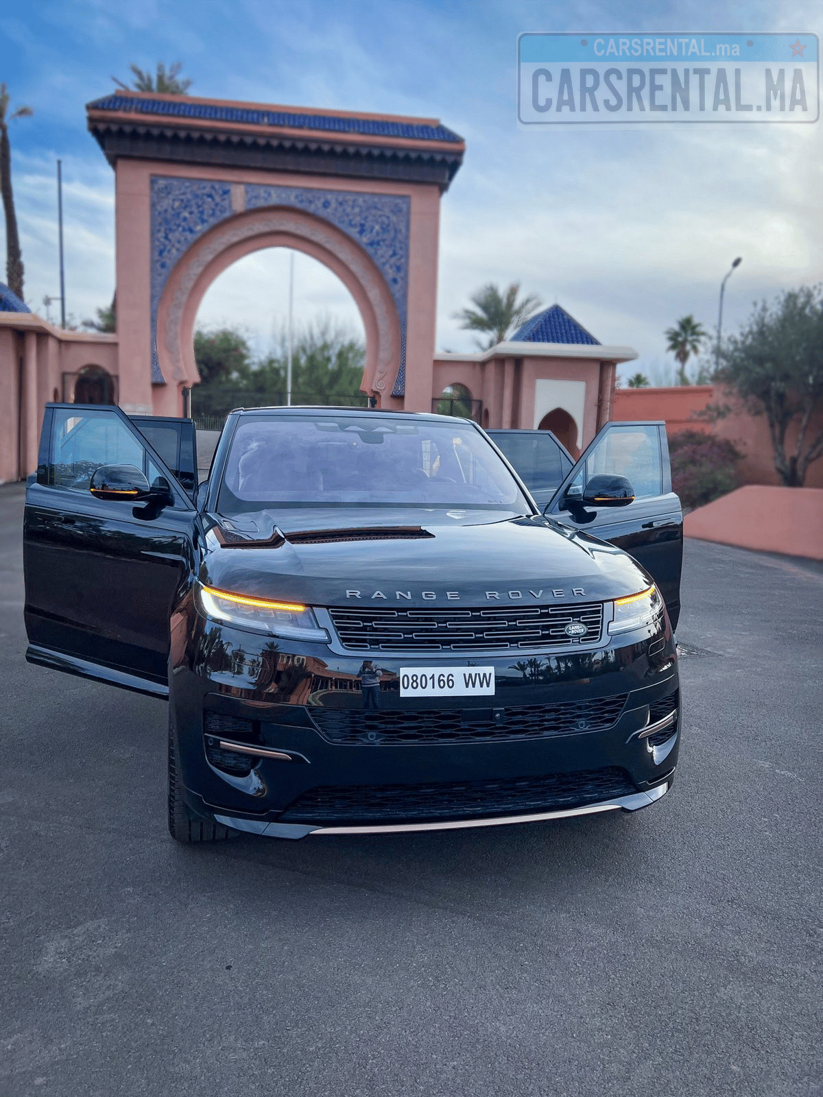 Range Rover Sport rental car near traditional Marrakechi door in Morocco